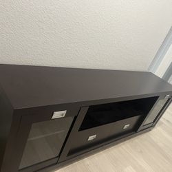 Original $900 TV Stand in the color DARK BROWN 
