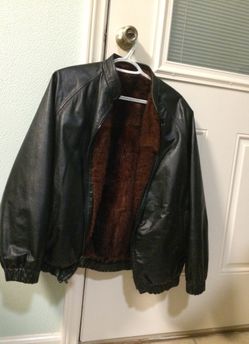 Ladies : Leather jacket with fur liner .
