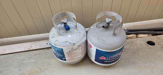 2 Propane tanks.  One is full 30$