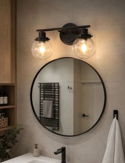 Upgrade your home with this beautiful 6-light farmhouse chandelier featuring a durable matte black finish and elegant clear glass shades. This stylish