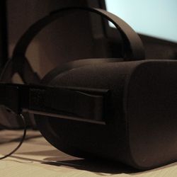 Oculus Rift w/ear buds and 2 extra sensors