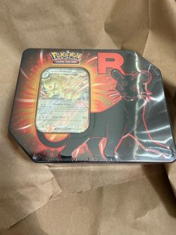 Team rocket collectors tin