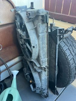Escalade radiator electric fan and ac denser
