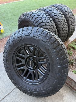 Chevy Silverado wheels Tacoma on 285/70/17 TOYO RT 6x139.7 rims 17x8.5 ET18