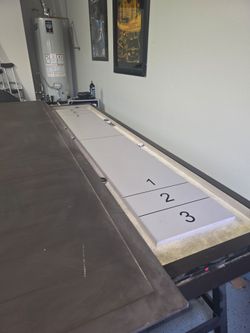 Shuffle board table with 6 chairs