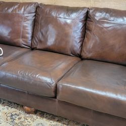 Ashley Furniture brown genuine leather sofa