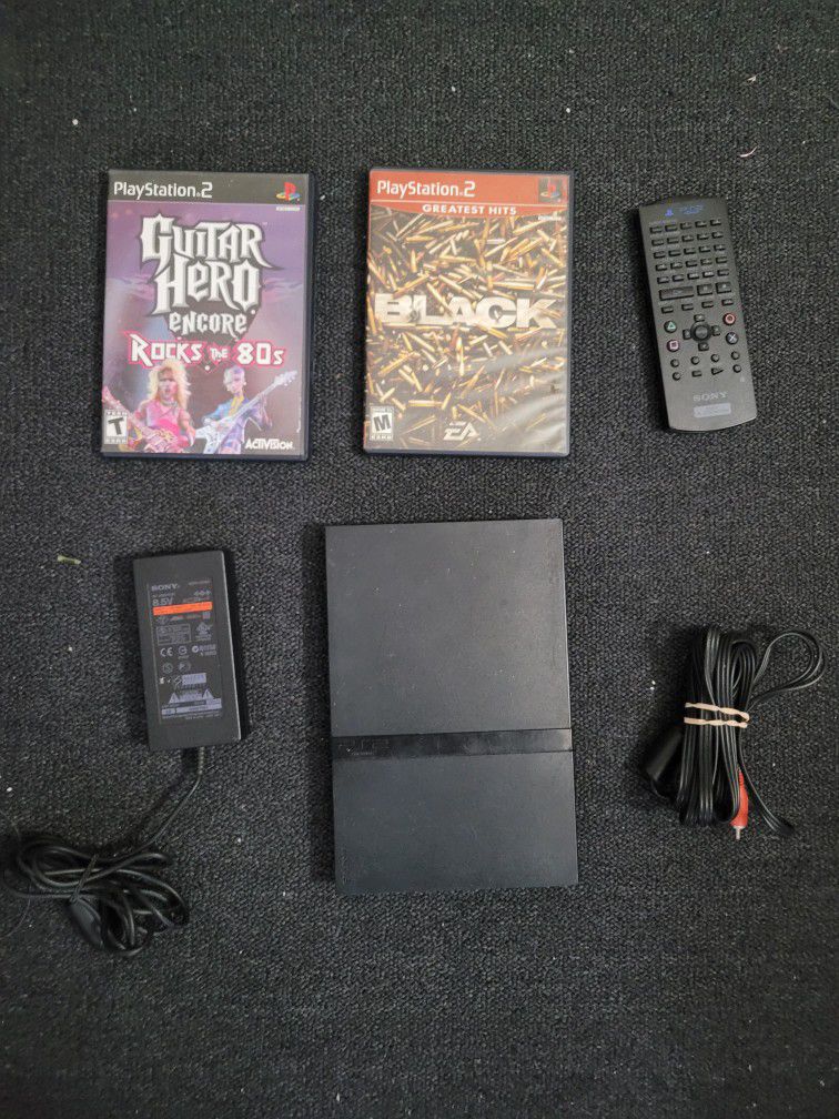 Ps2 Slim + Wires/ 2 Games