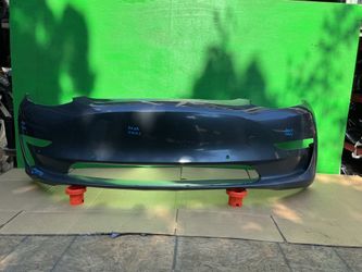 FRONT BUMPER TESLA MODEL 3  2017 2018 2019 2020 2021 2022 2023 WITH HOLES FOR SENSORS OEM