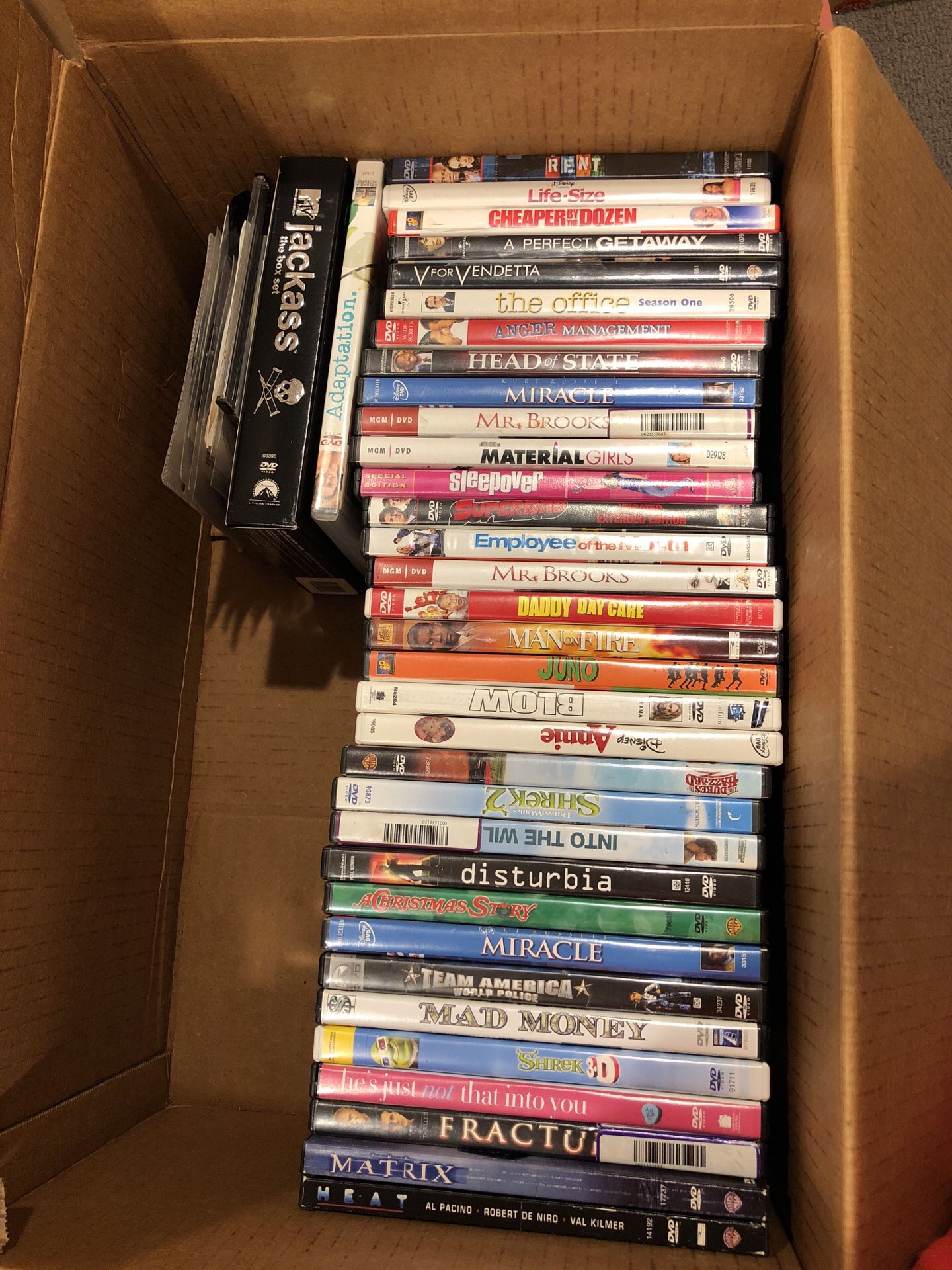 Lot of 50 dvds $50 the office Superbad disturbia shrek jackass miracle sisterhood of the traveling pants anger management into the wild