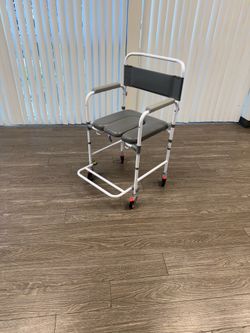 $35 / Shower and Raised toilet seat on wheels / New / Locking wheels