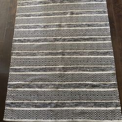 Abstract Black/Off White Rug - 48” X 73”
