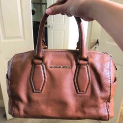 Leather Michael Kors satchel handbag.