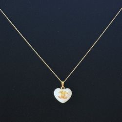 Solid Gold 10k 18” Chain stamped and tested with a white heart designer Pendant. Last One