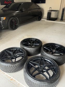 Gloss Black 5-Spoke Wheels with Continental Tires – Set of 4