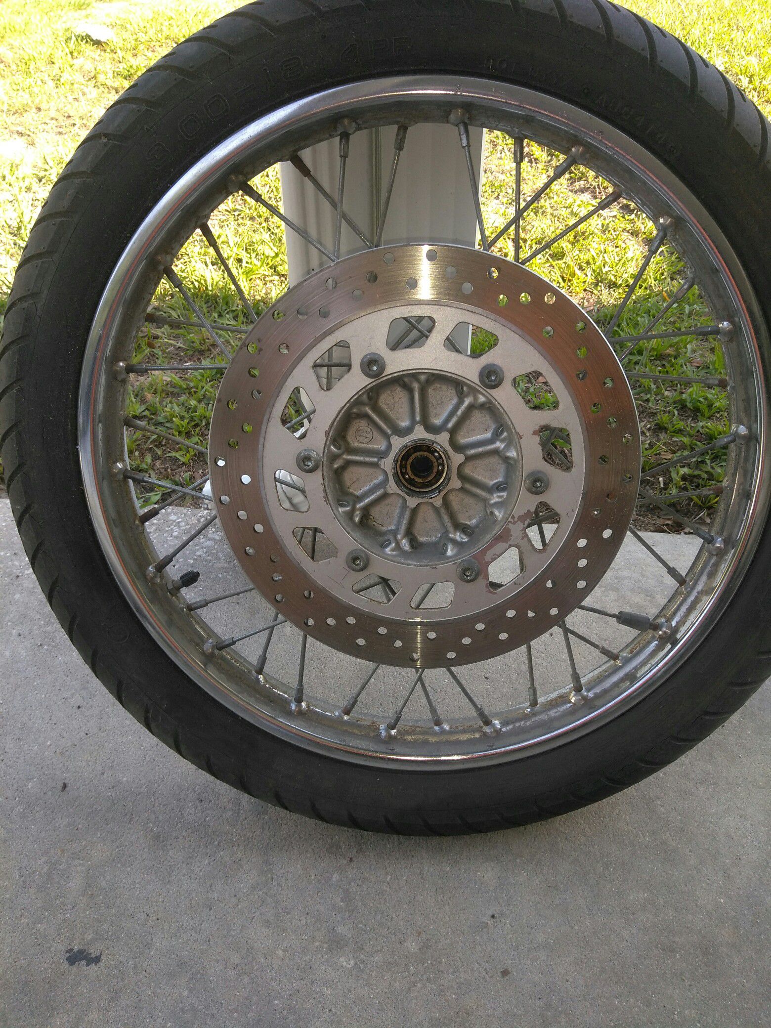 Crome polished motorcycle times with tires