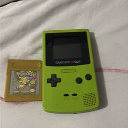 Green game boy color with Pokémon gold