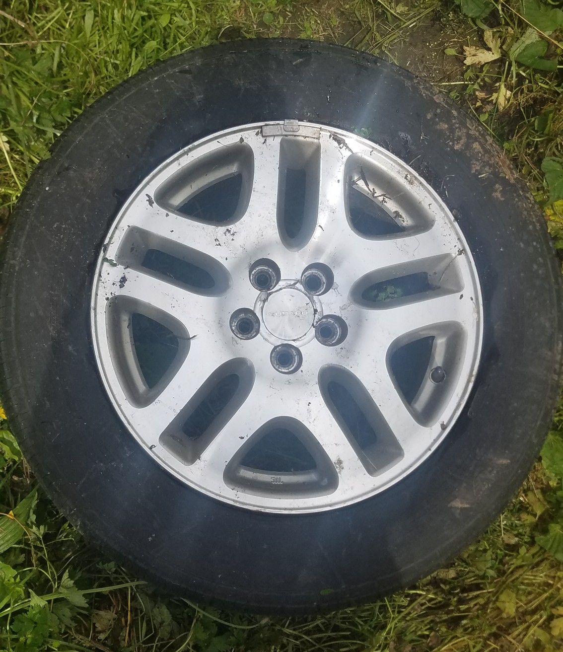 Set of Subaru rims and tires