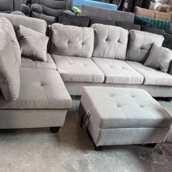 gray sectional with storage ottoman