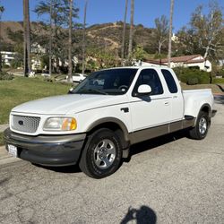 1999 ford F-150 Lariat extended Cab short bed step-side v8 5.4L with 105,000 org miles