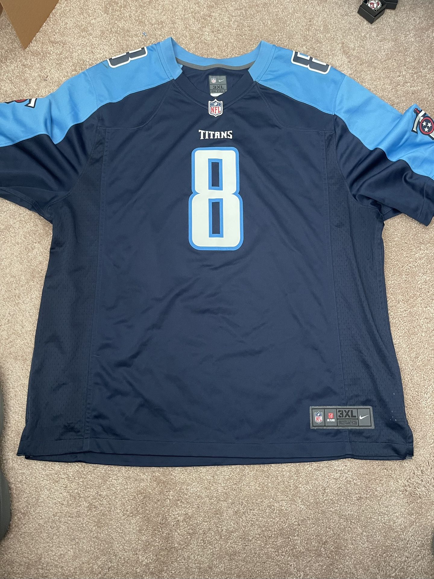 Marcus Mariota Jersey signed by Mike Vrabel and others