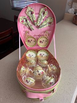 Brand new Toysmith Li'l Tea Tote ceramic tea set featuring a pink carrying case and floral-patterned porcelain pieces