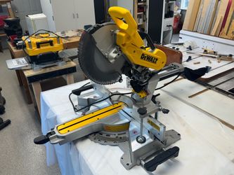 DEWALT 12” SLIDING COMPOUND MITER SAW DWS779 - NEW AND NEVER USED