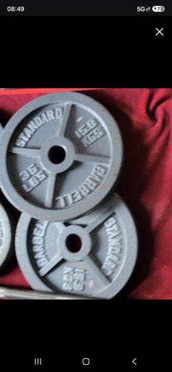 Two 35 lb plates w/ 2 inch hole