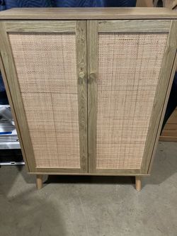 Modern 2 Door Rattan Accent Cabinet W/Natural Oak Finish. Still In Very Good Condition(See & Click On Pictures)
