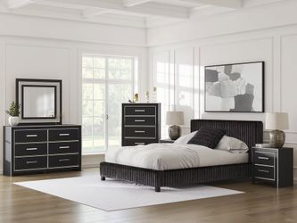 Glam looking bedroom set features corduroy upholstered bed