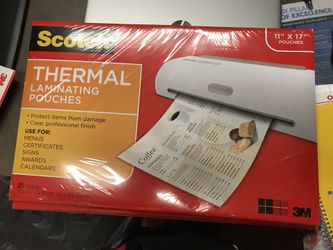 4 Unopened Thermal Laminating Packets.