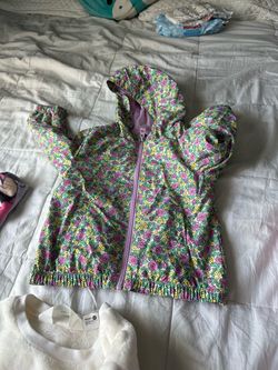 18 M. Rain Jacket