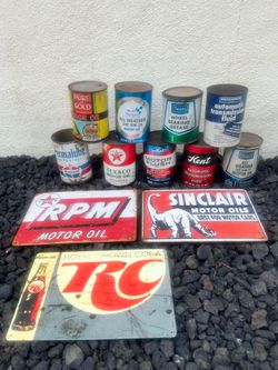 Vintage oil, cans, and signs