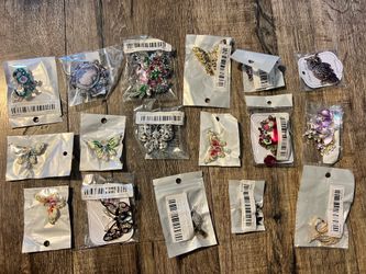 Brooches new with tags