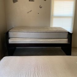 Slide Twin  Bed in good condition. Only two years old. Mattress are in excellent  shape. 