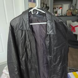 black leather jacket from the brand Reaction by Kenneth Cole. 
