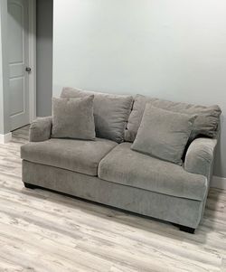 Used very clean but in fair condition sofa and loveseat