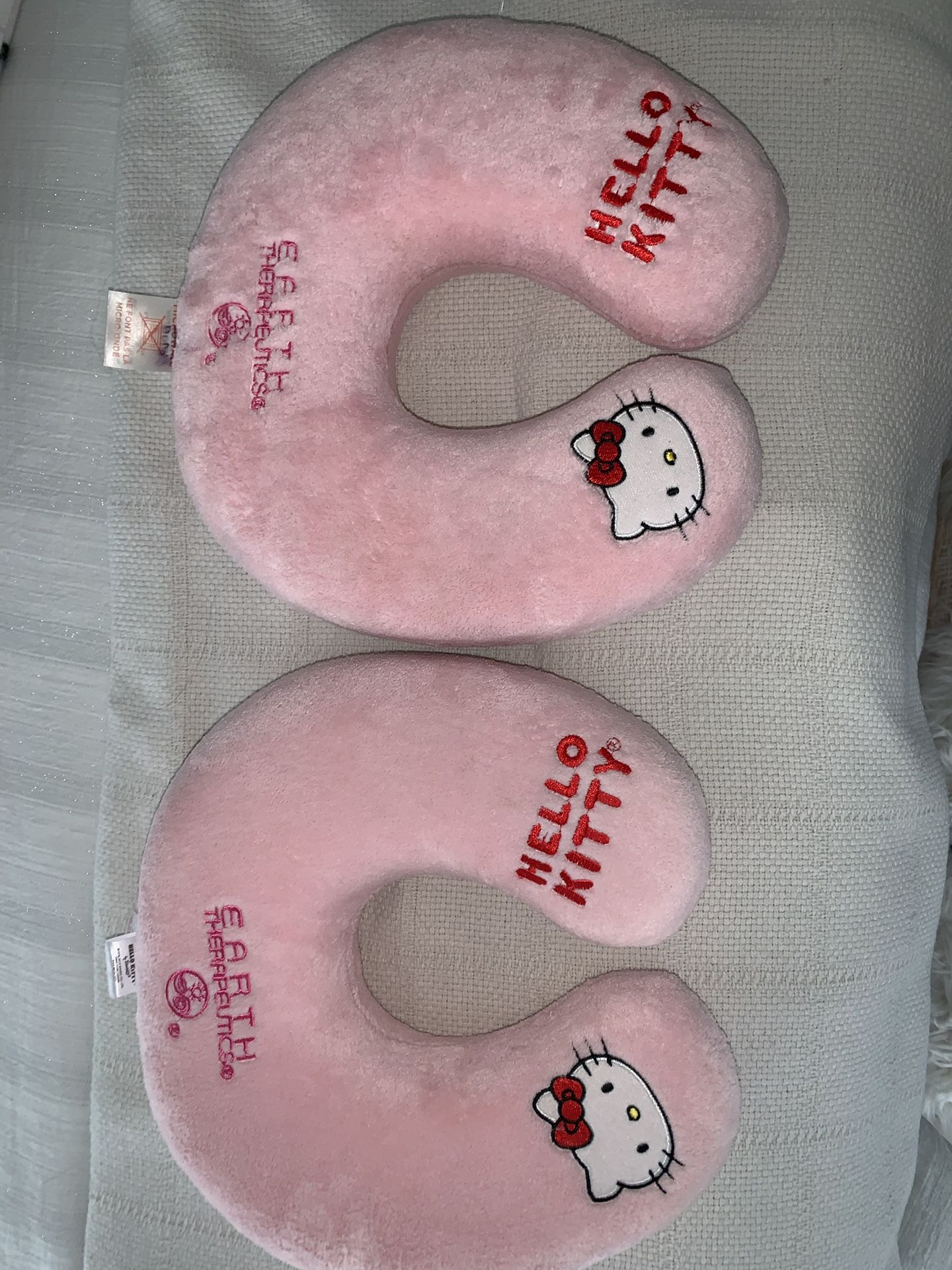 2 hello kitty travel pillows