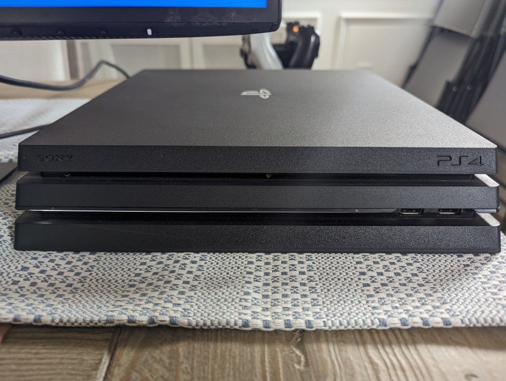 PlayStation 4 PRO - 1 TB - Two Controllers w/ Charging Station, Controller Paddles