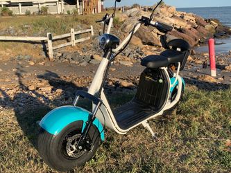 Electric fat tire cruising scooter. Beach, camping, Cruising fun