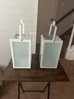 Pair of white  frosted lanterns