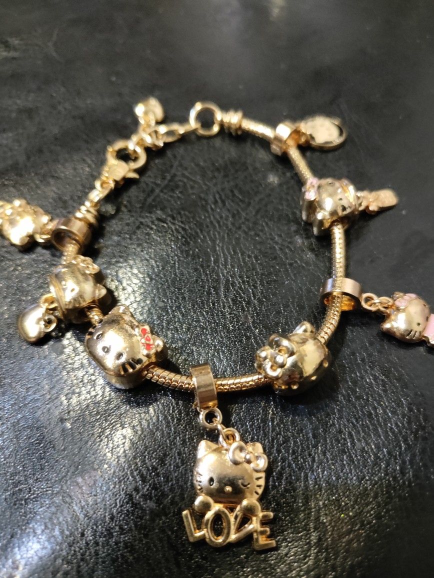 Gold Tone Hello Kitty Charm Bracelet