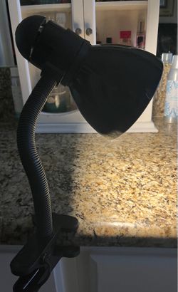 Black adjustable desk lamp with heavy duty clip