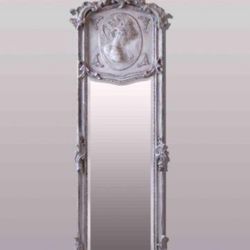  Baroque Style Mirror LOOK UP This is a baroque-style mirror with a cameo detail, likely a modern reproduction. TIME PERIOD Late 20th/Early 21st Centu