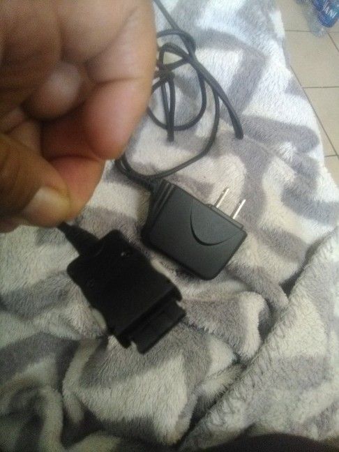 LG AC Adapter Model: TA-P01WS
Phone Charger