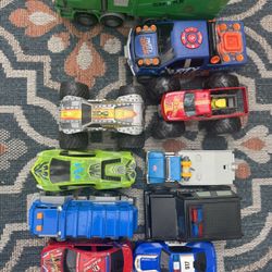 Lot Of Vehicles And Monster Trucks