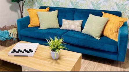 Blue velvet sofa