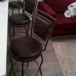 Three Brown Bar Stools 
