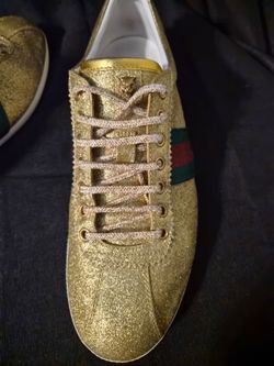 Men size 10 Gucci Gold tennis shoes