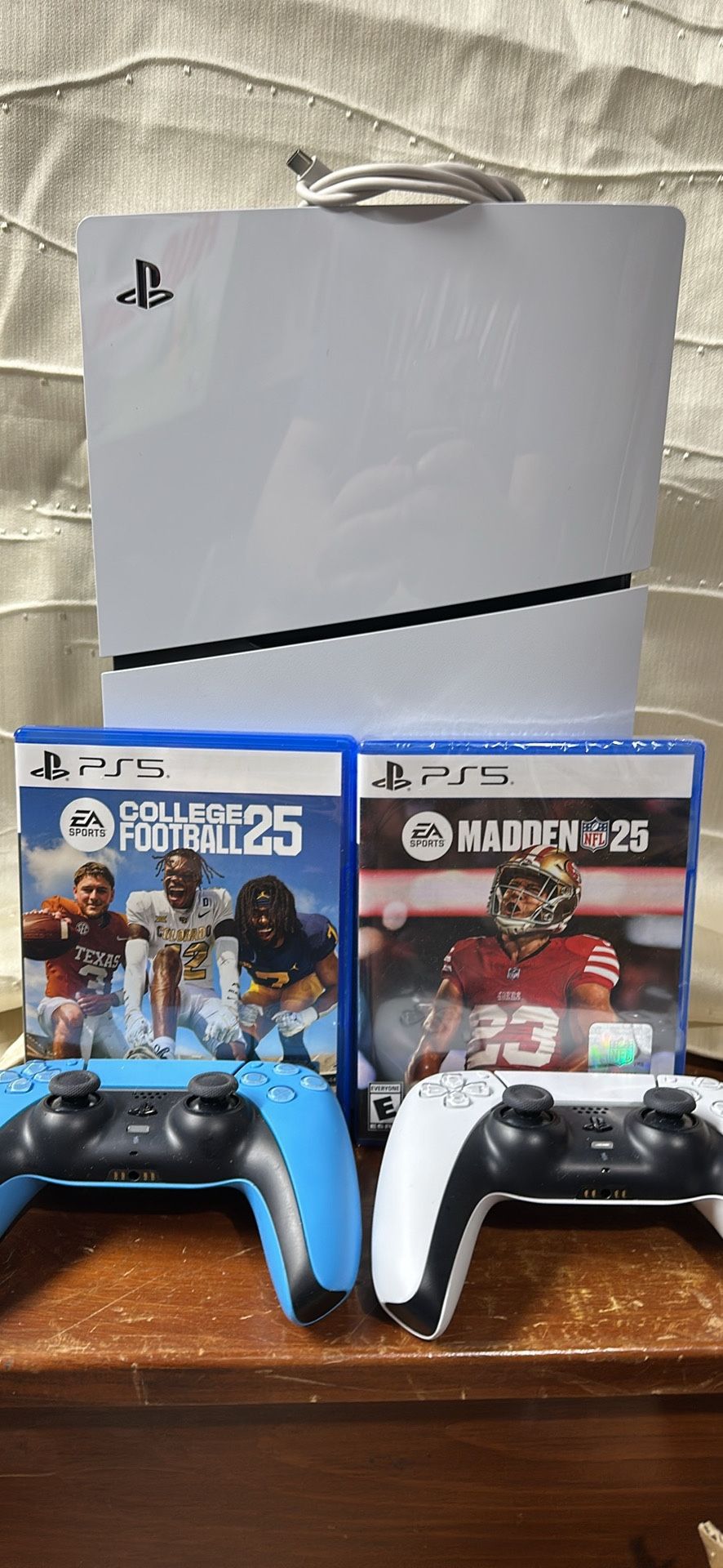 PlayStation 5 With Madden And CFB and Two Controllers