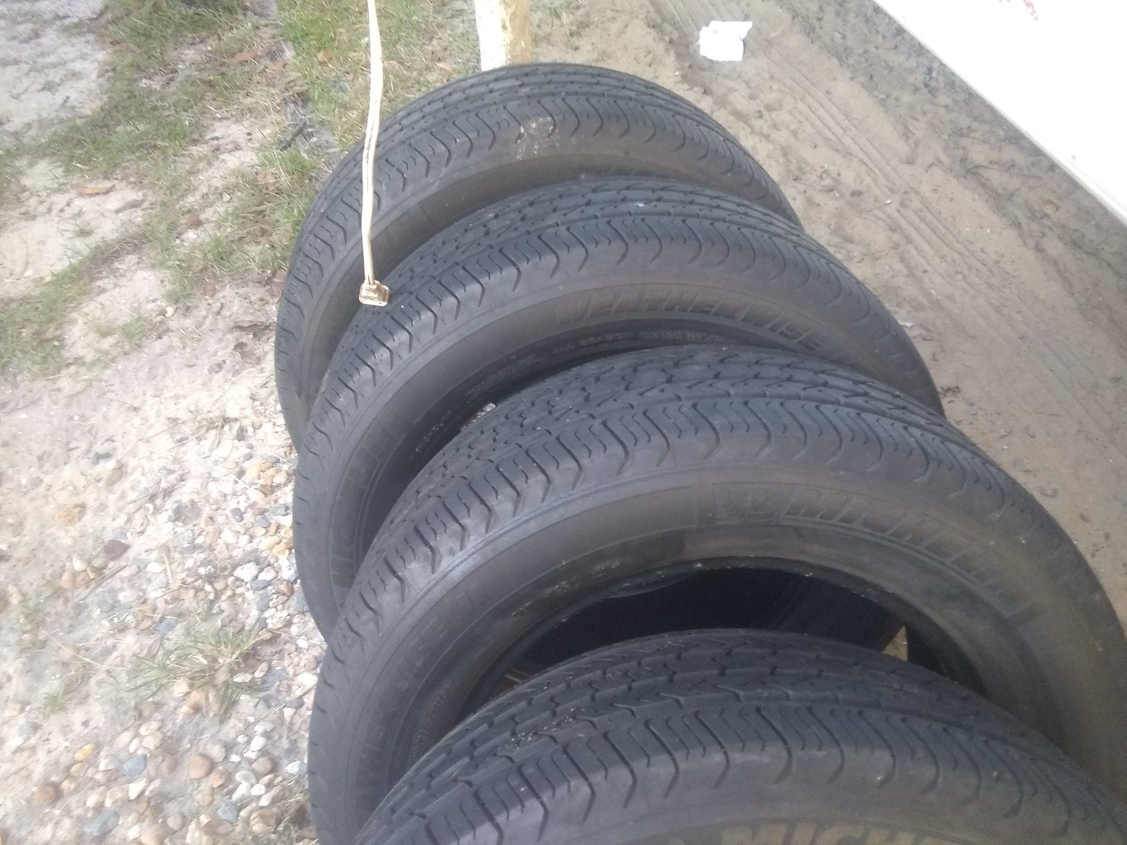 Set of 4 225/60/16 inch Michelin tires in good condition with about 70% tread left on them